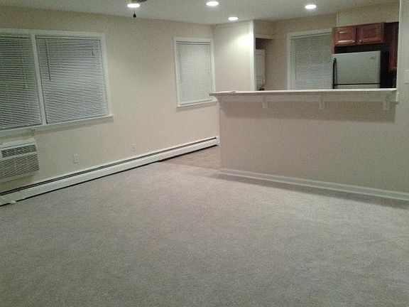 Livingroom from entry door, looking into kitchen