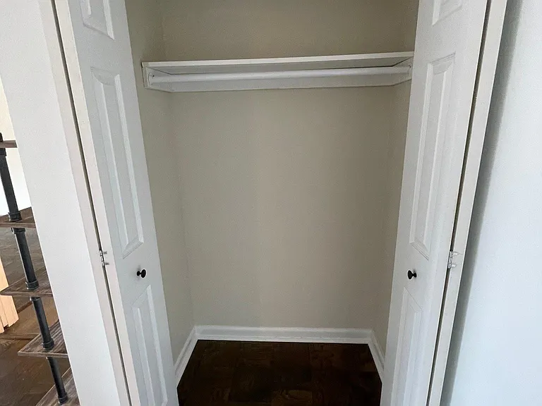 Entryway closet (to the right of the front door upon entering).