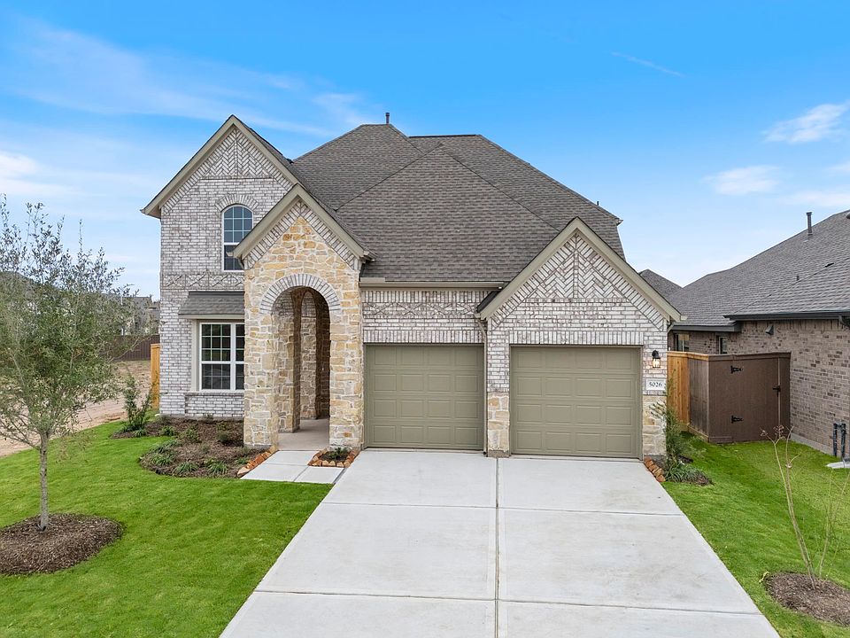 Welcome home to 5026 Jackson Robert Path located in the community of Brookwater and zoned to Lamar C