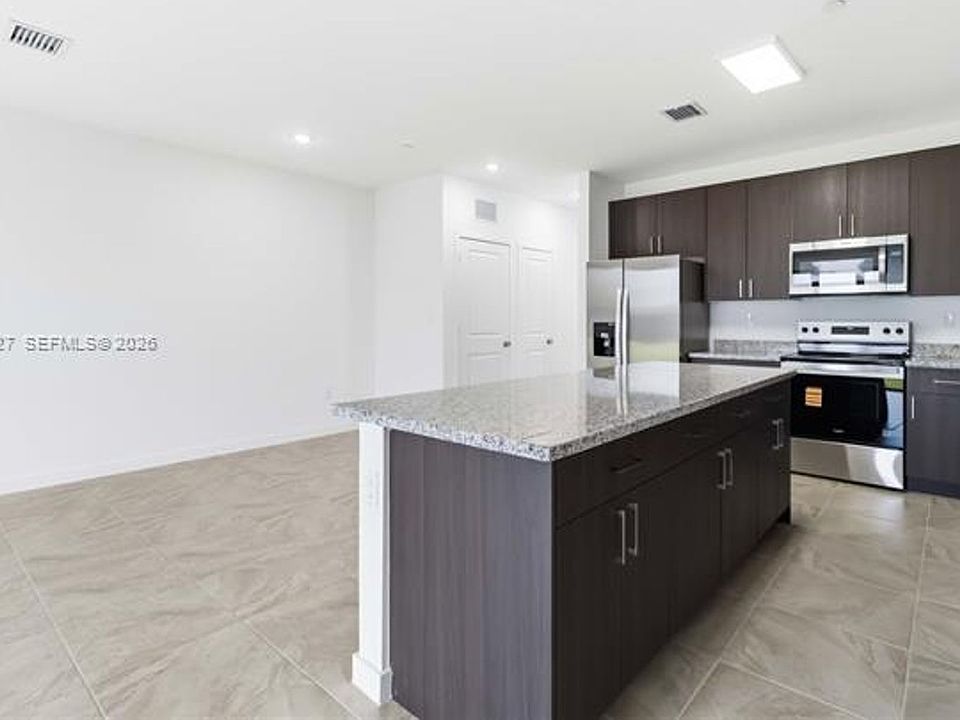 1st image of 22348 SW 115th Ct #Townhouse 22348