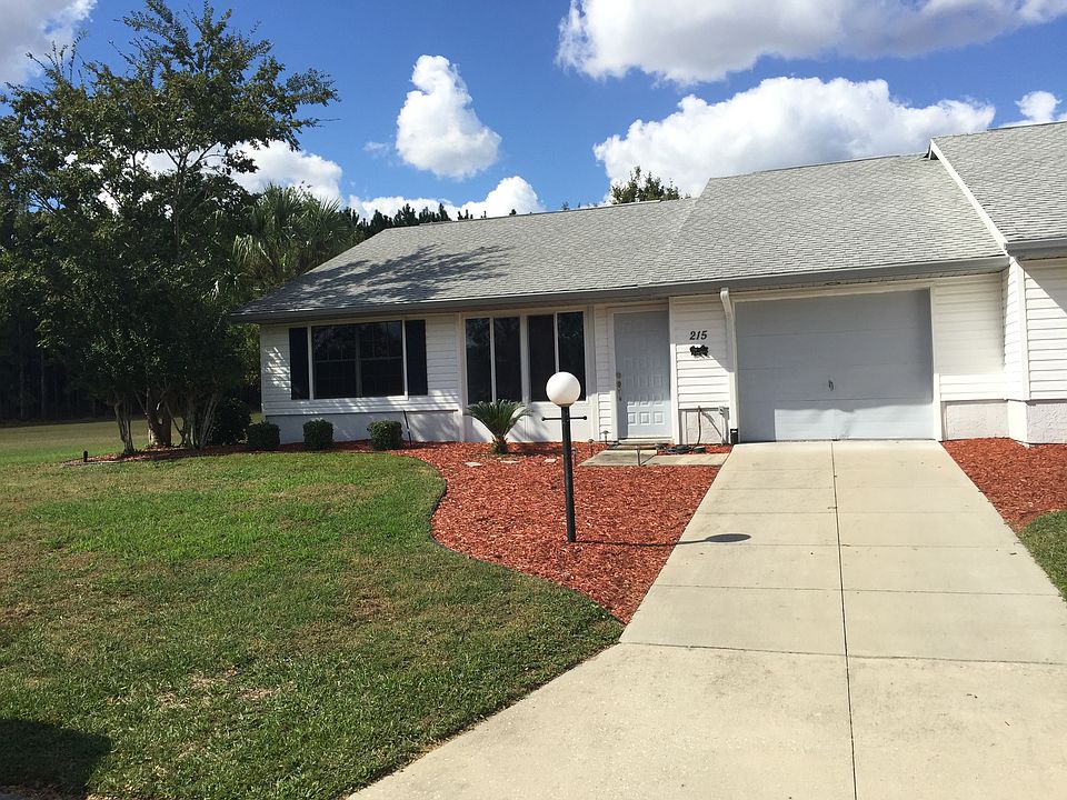 Front with new driveway