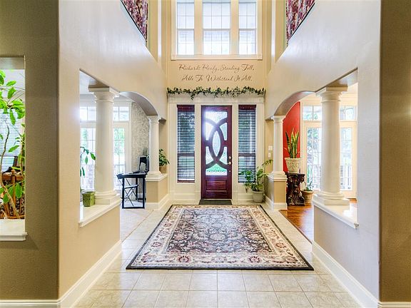 The open floor plan begins at the front door...