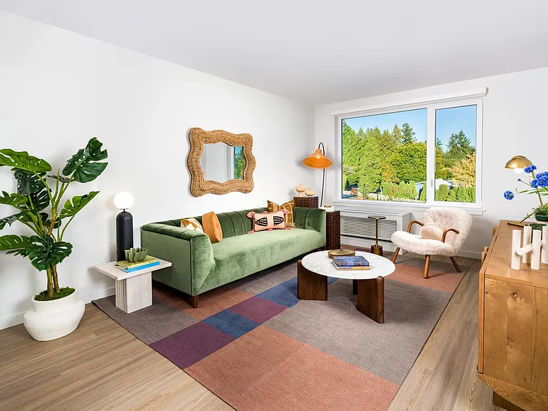 Soaring 9-foot ceilings, wood-style plank flooring, and oversized windows create a bright, open atmosphere that feels as elevated as your lifestyle.