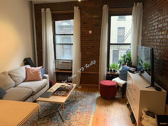 2nd image of 67 E 2nd St APT 13A