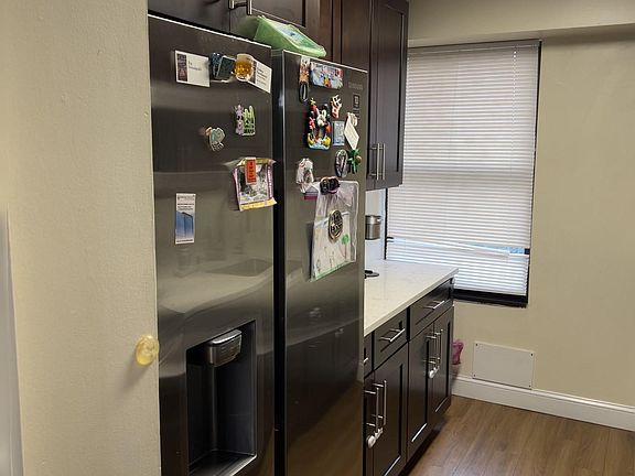 Brand New Kitchen with New Appliances, Quartz Counter Top and Matching Quartz Backsplash.