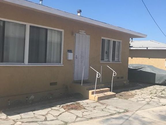 FRONT AREA OF HOUSE AND DRIVEWAY