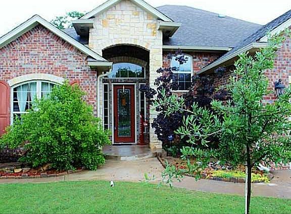 Other. Soaring entry way with an inviting beveled glass front door