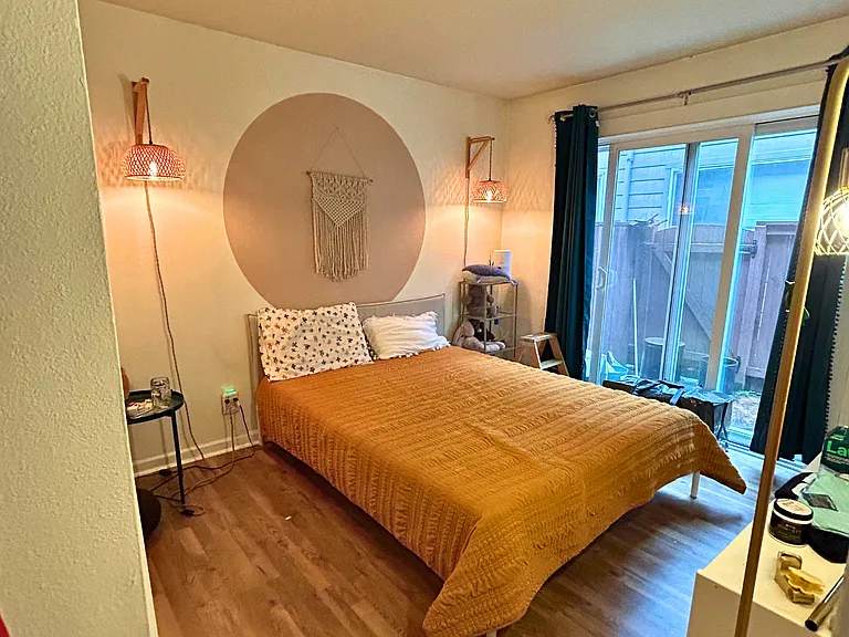 Bedroom with attached patio.