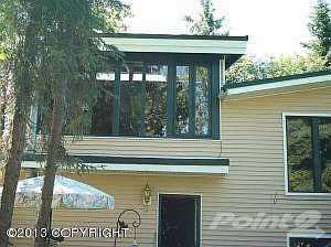 Back of home w/sunroom