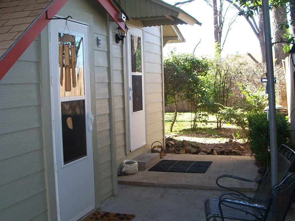 This is a view from the parking area. The utility room is the first door and the apartment door is on the right.