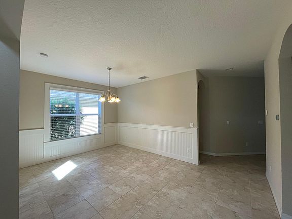 Dining room with wainscoting walls
