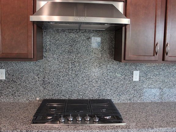 Gas Stove & Hood in Kitchen