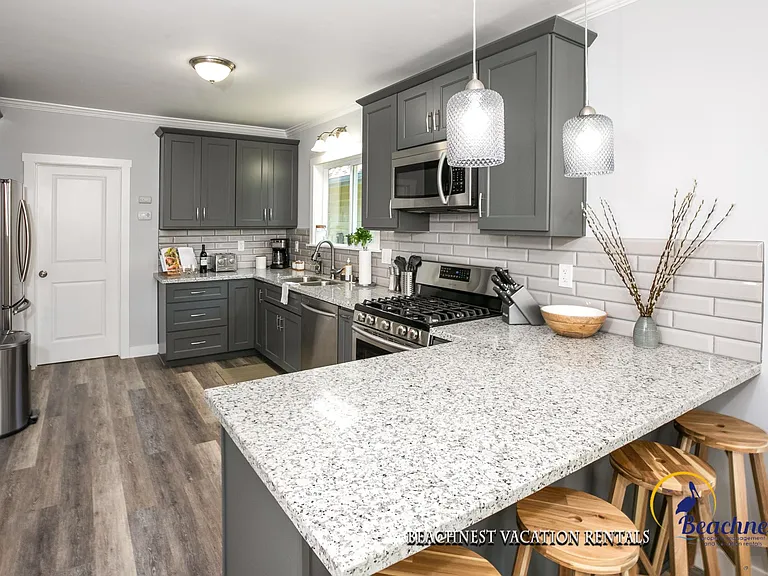 Granite counter tops and bar seating for 4.