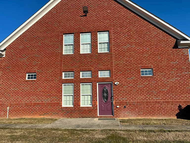 Side entrance to carriage house.