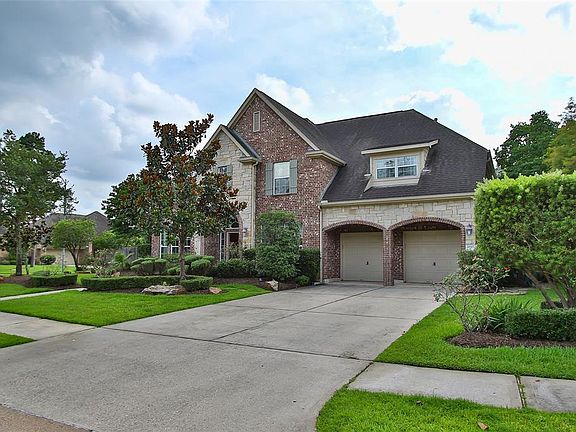 This home has a 3-car tandem garage providing plenty of storage space. Beautiful brick & stone elevation.