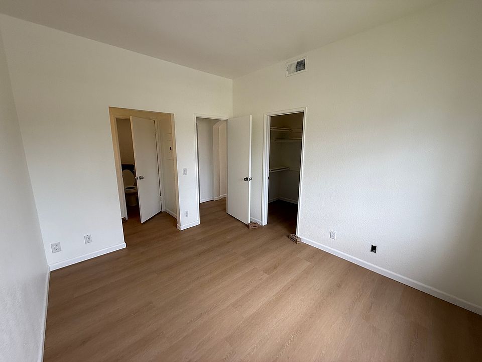 Bedroom with walk-in closet