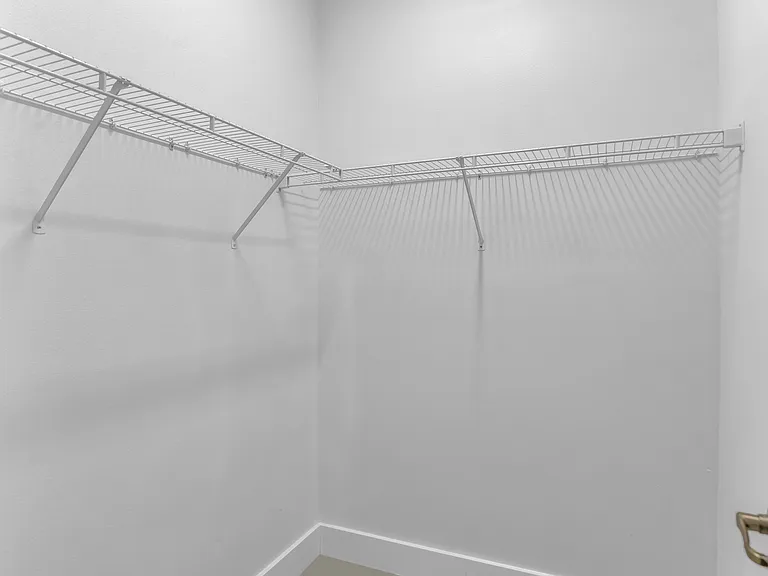 Primary Bedroom Walk-In Closet
