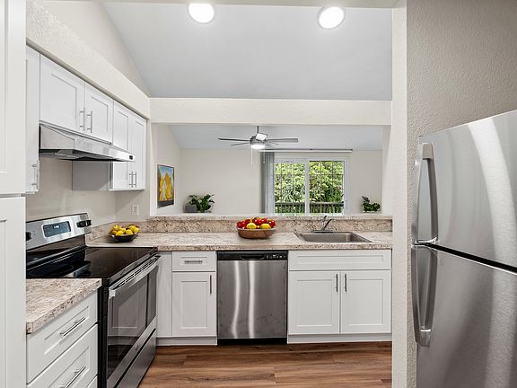 Experience modern living with this stylish kitchen, designed for both functionality and aesthetics.