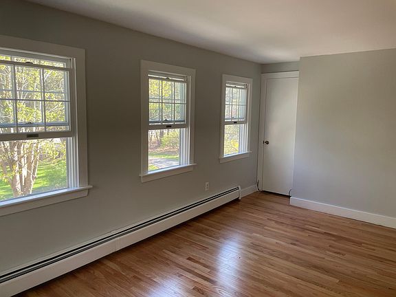 Living room and coat closet.