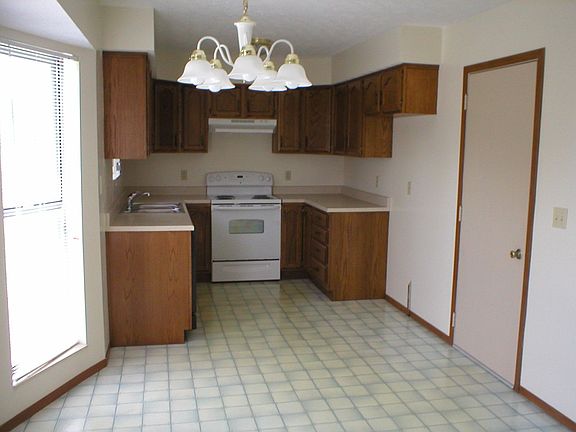 A view into the kitchen from the dining area.