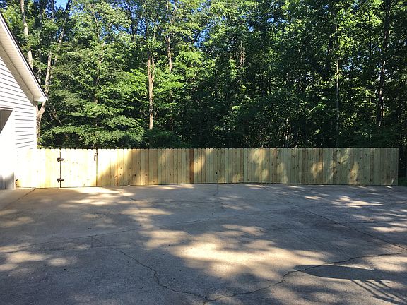Parking area & privacy fence