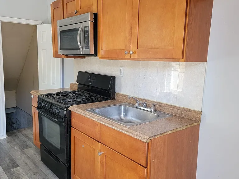 5208 Harlan St — Photo 1
