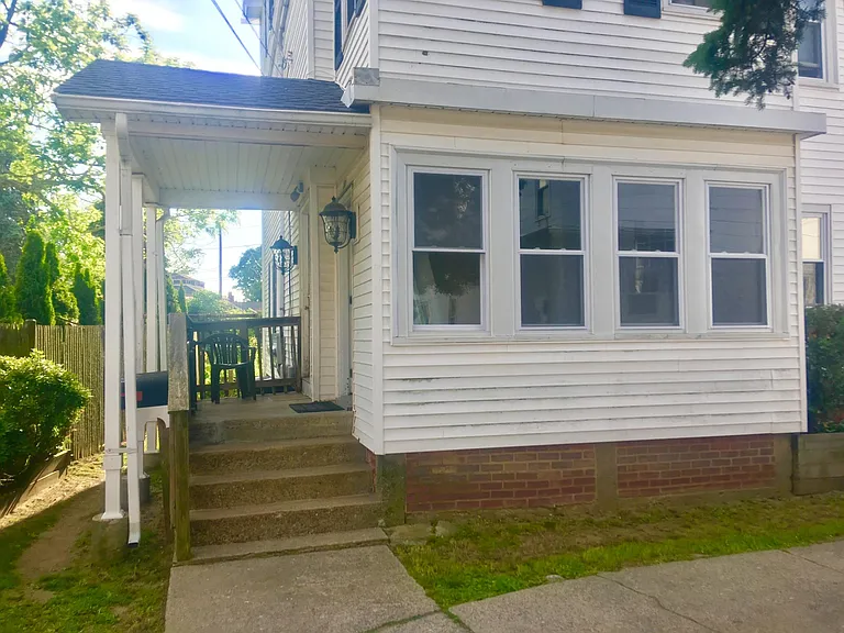 Exterior shows private entry and 3-season room