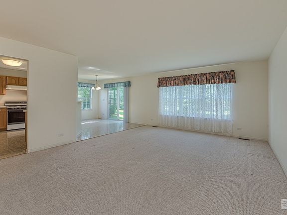 Large family/living room overlooking the backyard and open to the kitchen.