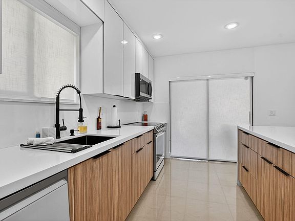 5th image of 6335 Longboat Lane W #E104