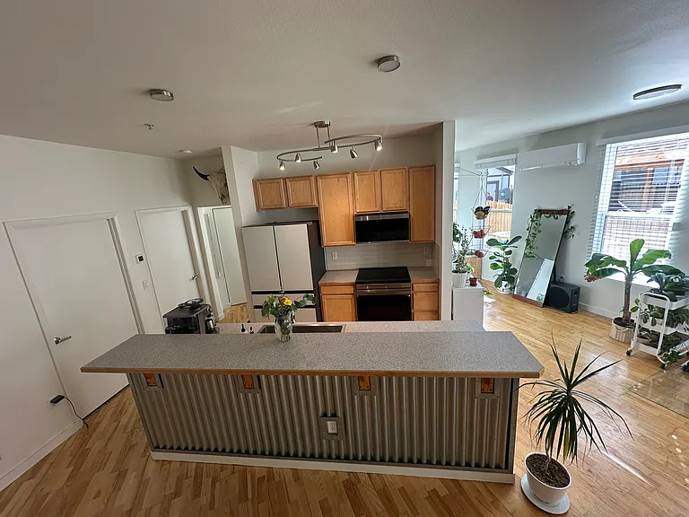 2422 Tremont Pl #103 — Photo 5