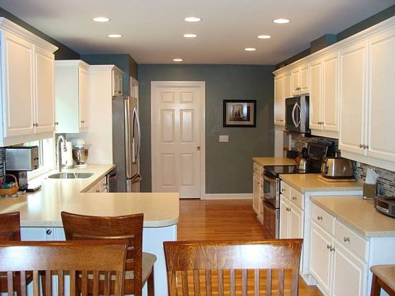 Keep an eye on dinner while watching the birds and working on a project at the kitchen island.