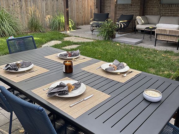 Newly renovated backyard is great for entertaining. Space for dining and covered pergola for shade or rain protection - Edison lights included in pergola