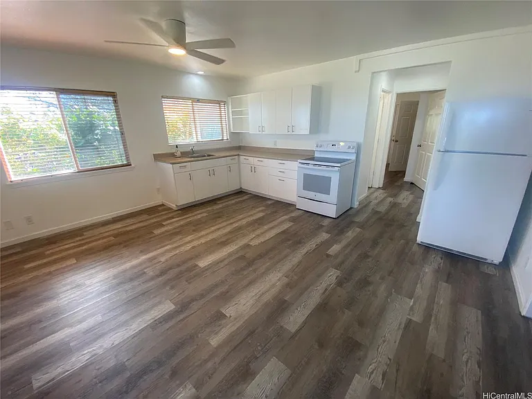 Open foor plan, new kitchen with new flooring.