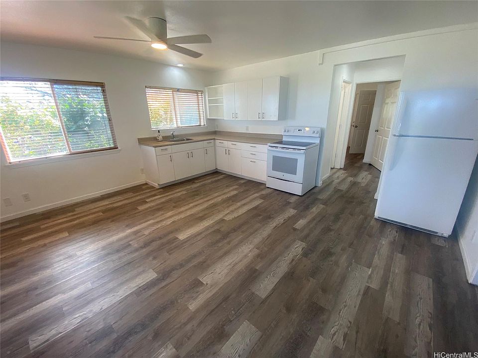 Open foor plan, new kitchen with new flooring.