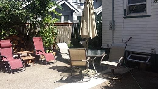Shared patio near separate entrance to basement.