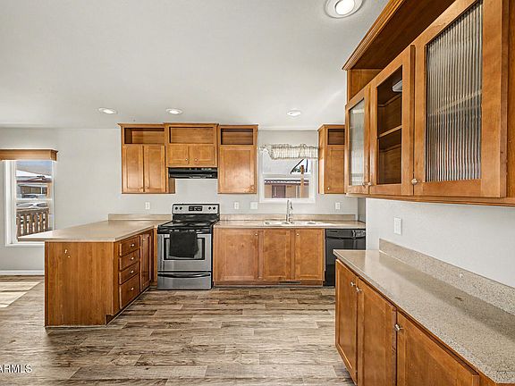 2nd image of 12721 W Greenway Road #207