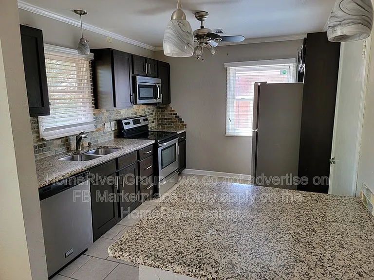 2832 NW 66th St — Photo 3