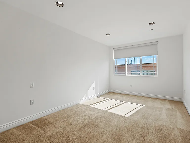 Bedroom with Recessed Lighting and Windows
