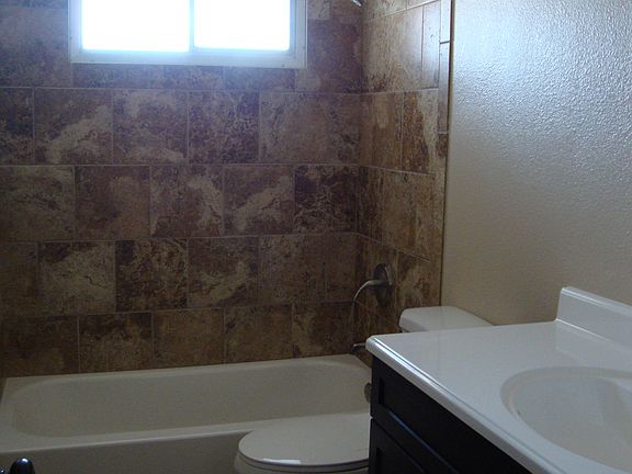 Guest bathroom with bathtub