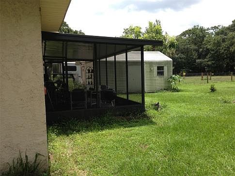 Big Screened Back Porch for Relaxing