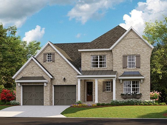 Marin B - English Cottage 2-Car Front Load Garage Note Renderings may show optional features