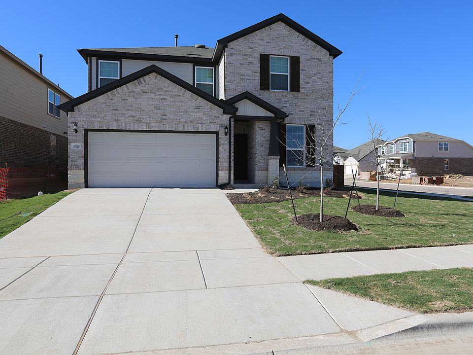 Driveway, Front Yard and House View
