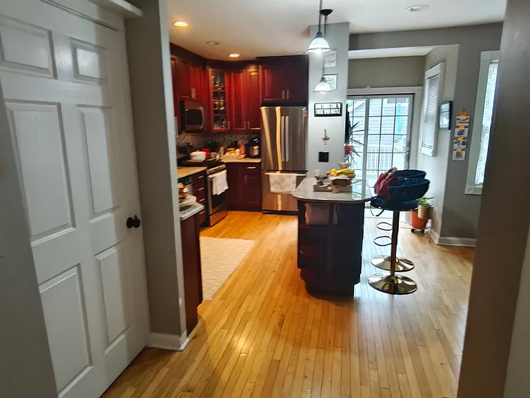 door on left, entry to basement.