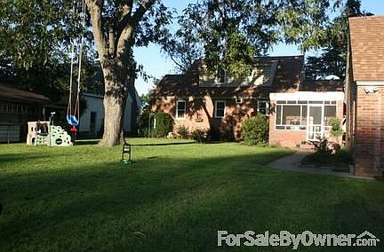Back yard
						:
						Screened-in porch, 2-car garage w/attic, mature Pecan tree gives great shade.