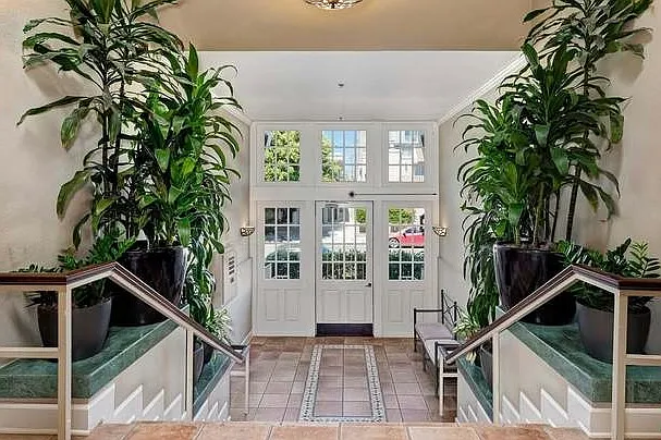 Building lobby leading to mailboxes