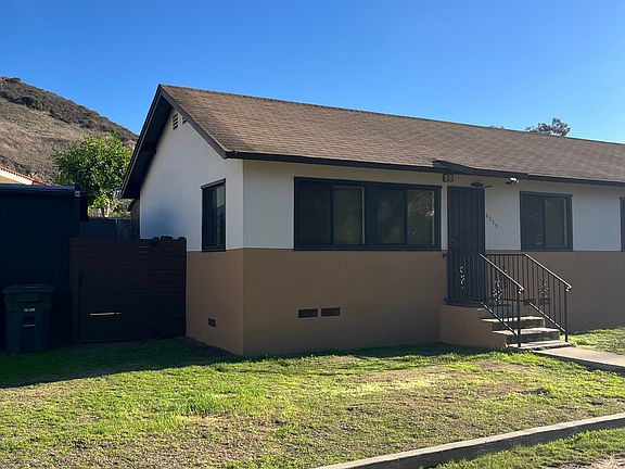 Parking is on the dirt/grass in front of the unit.