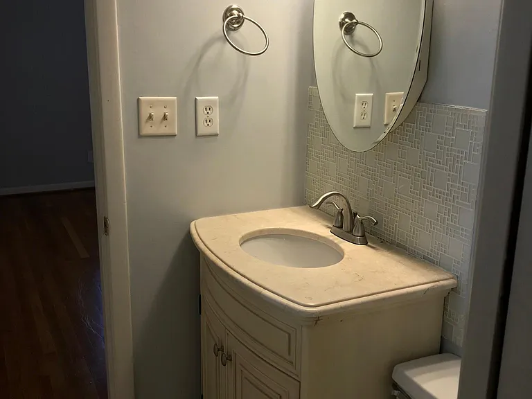 Master bath with one of two sinks showing