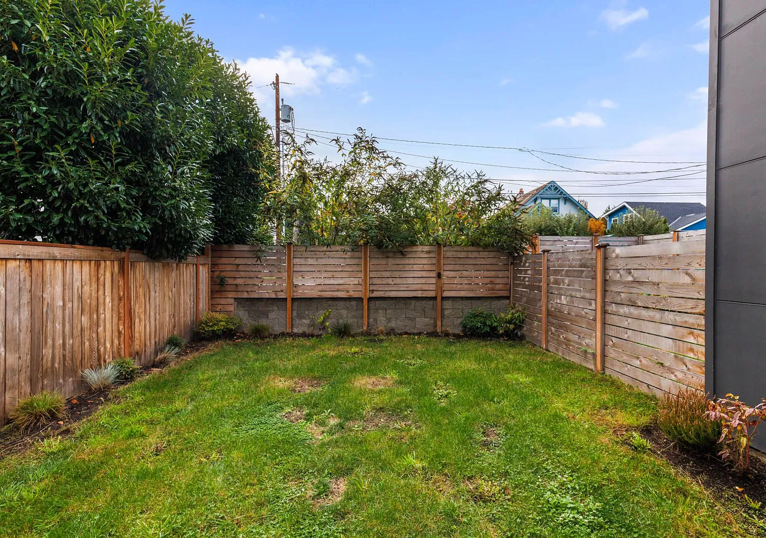 Modern Greenwood Living with a Private Yard, Rooftop Deck & Dedicated Parking! — Photo 3