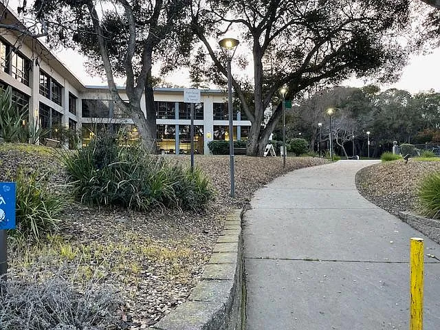 On block from public library and park.