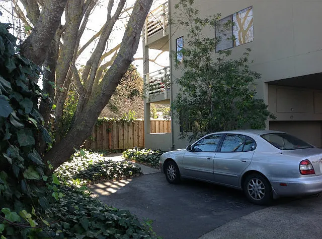 Ground floor condo with two patios, one outside of living room, one outside of bedroom.
